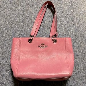 Pink coach purse! Beautiful and only worn once to nice event! Deep and spacious!
